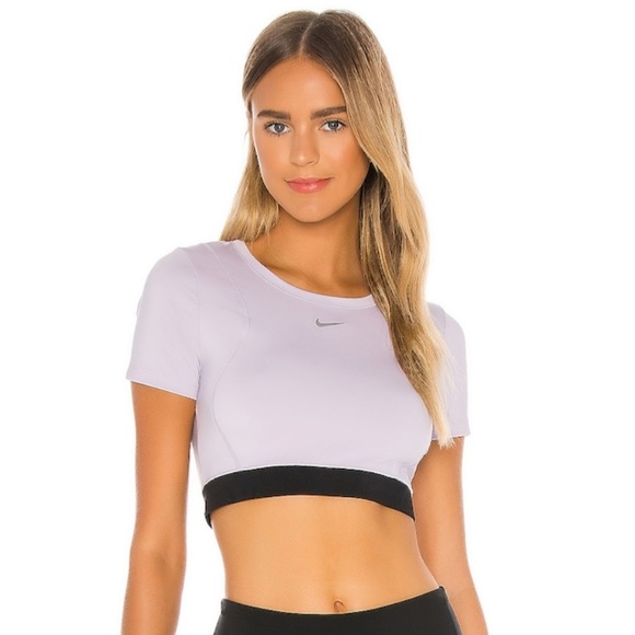 Nike Tops - Revolve Nike Aeroadapt shirt size medium